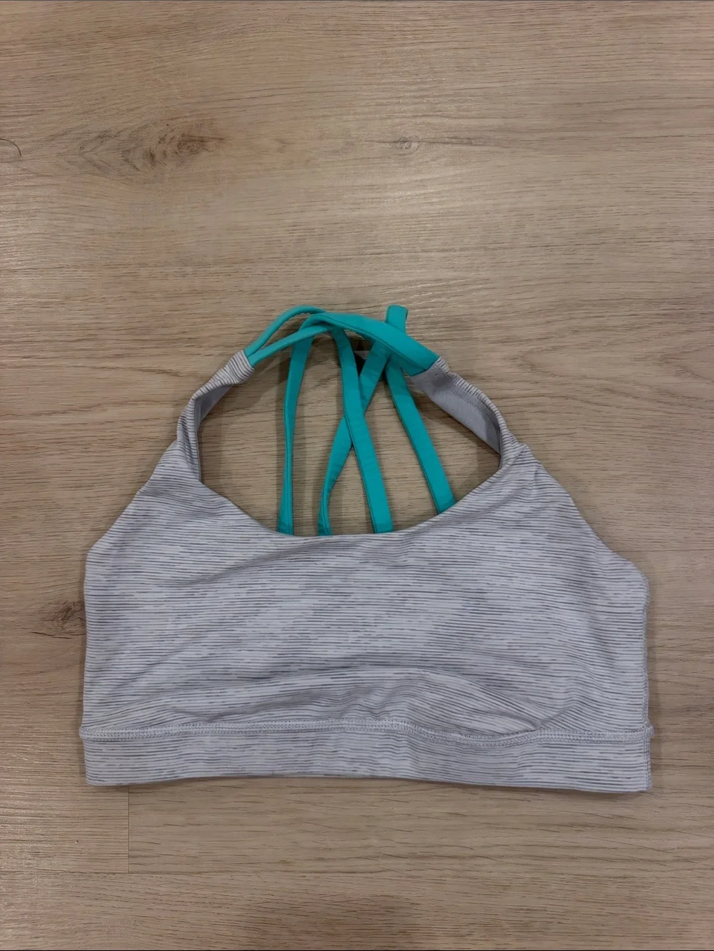 Lululemon size 6 Women’s Heather Gray Sports Bra with Teal Straps